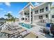 Luxury pool and expansive deck with lounge chairs at 42 Midway Is, Clearwater, FL 33767