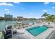 Relaxing pool and deck area with lounge chairs, offering waterfront views at 42 Midway Is, Clearwater, FL 33767