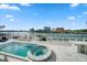 Inviting pool and spa with ample deck space for lounging at 42 Midway Is, Clearwater, FL 33767
