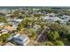 House and surrounding neighborhood, showcasing location and proximity to water at 553 Division St, Tarpon Springs, FL 34689