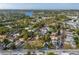 An aerial view showing the house and its surroundings near the water at 553 Division St, Tarpon Springs, FL 34689