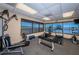Community gym featuring modern exercise equipment and panoramic water views at 634 Edgewater Dr # 644, Dunedin, FL 34698