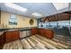 Well-equipped kitchen featuring stainless steel appliances and dark wood cabinetry at 634 Edgewater Dr # 644, Dunedin, FL 34698