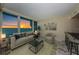 Bright living room with floor to ceiling windows and a water view at 634 Edgewater Dr # 644, Dunedin, FL 34698
