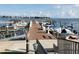 Community boat docks with many boats and waterfront views at 4900 Brittany S Dr # 1303, St Petersburg, FL 33715