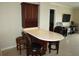 Breakfast bar with wine rack and seating for three at 4900 Brittany S Dr # 1303, St Petersburg, FL 33715