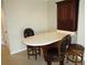 Breakfast bar with wine rack and seating for three at 4900 Brittany S Dr # 1303, St Petersburg, FL 33715