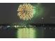 Spectacular fireworks display over calm water at 4900 Brittany S Dr # 1303, St Petersburg, FL 33715