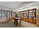 Well-lit library with numerous bookshelves and comfortable seating at 4900 Brittany S Dr # 1303, St Petersburg, FL 33715