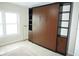 Room with a built-in Murphy bed and shelves for storage at 4900 Brittany S Dr # 1303, St Petersburg, FL 33715
