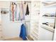 Large walk-in closet with ample shelving and hanging space at 4900 Brittany S Dr # 1303, St Petersburg, FL 33715