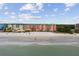 Aerial view of beachfront property with multiple buildings and beach access at 18400 Gulf Blvd # 1105, Indian Shores, FL 33785