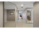 Bright hallway with mirrored wall and views into living and bedroom areas at 18400 Gulf Blvd # 1105, Indian Shores, FL 33785