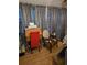 Bedroom corner featuring a red chair and wooden desk at 6015 19Th N St # 308, St Petersburg, FL 33714