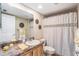 Simple bathroom with updated vanity and shower/tub combo at 8210 Aquila St # 223, Port Richey, FL 34668