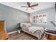 Cozy bedroom with a double bed, ceiling fan, and plenty of natural light at 8210 Aquila St # 223, Port Richey, FL 34668