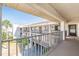 Exterior view of condo building with balcony access at 8210 Aquila St # 223, Port Richey, FL 34668