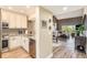 Open concept kitchen with island and stainless steel appliances at 8210 Aquila St # 223, Port Richey, FL 34668