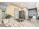 Modern kitchen with granite countertops and stainless steel appliances at 8210 Aquila St # 223, Port Richey, FL 34668