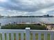 Tranquil waterfront view with dock and boat at 8210 Aquila St # 223, Port Richey, FL 34668