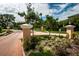 Gated entrance to Sunset Bay Townhomes community at 1500 Ember Ln, Tarpon Springs, FL 34689