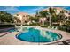 Cool off in this inviting kidney-shaped community pool at 1500 Ember Ln, Tarpon Springs, FL 34689
