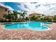 Enjoy this refreshing kidney-shaped pool with a spa at 1500 Ember Ln, Tarpon Springs, FL 34689