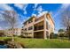 Three-story building with screened balcony and water views at 1500 Ember Ln, Tarpon Springs, FL 34689