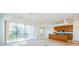 Modern kitchen with granite counters and breakfast bar at 1500 Ember Ln, Tarpon Springs, FL 34689