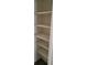 Empty pantry with five shelves at 1153 Tamarac Dr, Holiday, FL 34690