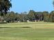 Scenic view of the golf course with vibrant green grass at 8551 Electra Ave, Brooksville, FL 34613