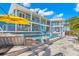 Beautiful backyard oasis with pool, fire pit, lounge area and waterfront views from this lovely home at 295 Bayside Dr, Clearwater Beach, FL 33767