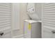 A stackable washer and dryer are conveniently located in the laundry room of this property at 295 Bayside Dr, Clearwater Beach, FL 33767