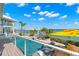 Gorgeous backyard pool and waterfront view, perfect for relaxing and entertaining guests at 295 Bayside Dr, Clearwater Beach, FL 33767