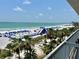 Beachfront view with inflatable water slide on the sand at 5500 Gulf Blvd # 7211, St Pete Beach, FL 33706