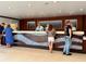 Hotel reception desk with staff assisting guests at 5500 Gulf Blvd # 7211, St Pete Beach, FL 33706