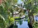 Peaceful resort canal with lush landscaping at 5500 Gulf Blvd # 7211, St Pete Beach, FL 33706