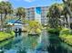 Picturesque resort canal and lush gardens at 5500 Gulf Blvd # 7211, St Pete Beach, FL 33706