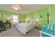 Cozy bedroom with light walls and a queen-size bed at 105 Island Way # 121, Clearwater Beach, FL 33767