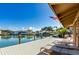 Community dock with lounge chairs and waterfront views at 105 Island Way # 121, Clearwater Beach, FL 33767