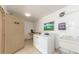 Shared laundry room with washer and dryer at 105 Island Way # 121, Clearwater Beach, FL 33767