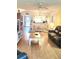 Living room with hardwood floors, leather furniture, and a coffee table at 105 Island Way # 121, Clearwater Beach, FL 33767