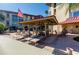 Relaxing pool area with shaded seating at 105 Island Way # 121, Clearwater Beach, FL 33767