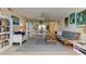 Spacious living room with comfortable seating and access to the balcony at 403 Gulf Way # 504, St Pete Beach, FL 33706