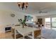 Bright living room with sliding glass doors to the balcony at 403 Gulf Way # 504, St Pete Beach, FL 33706