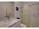 Bathroom with a walk-in shower and modern vanity at 12821 Bergstrom Bay Dr, Riverview, FL 33579