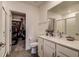 Bathroom features a vanity, toilet, and walk-in shower at 12821 Bergstrom Bay Dr, Riverview, FL 33579