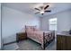Bedroom with a bed, nightstand, and ceiling fan at 12821 Bergstrom Bay Dr, Riverview, FL 33579