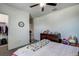 Bright bedroom with a double bed, dresser, and walk-in closet at 12821 Bergstrom Bay Dr, Riverview, FL 33579