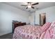 Bedroom with floral bedding and en-suite bathroom access at 12821 Bergstrom Bay Dr, Riverview, FL 33579